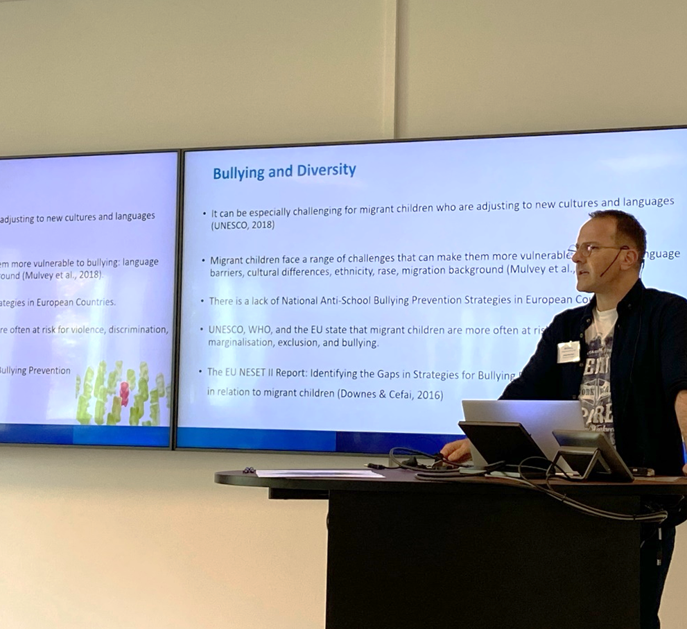 Aleksandar Bozic presenting research on bullying and diversity
